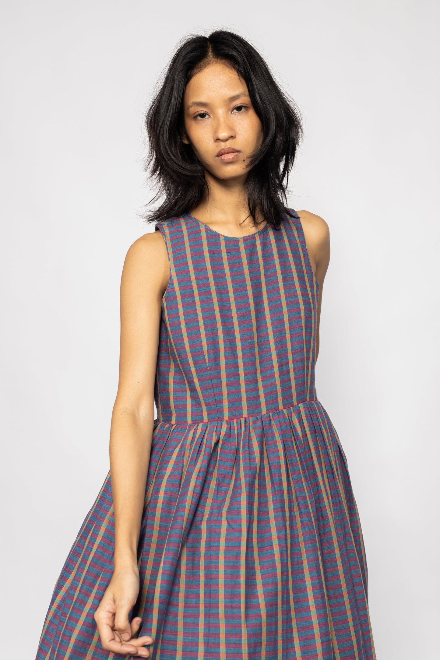 Plains Design Ralfi Dress – handwoven handspun cotton sleeveless dress in multicolour stripe, relaxed easy shape, front view close-up