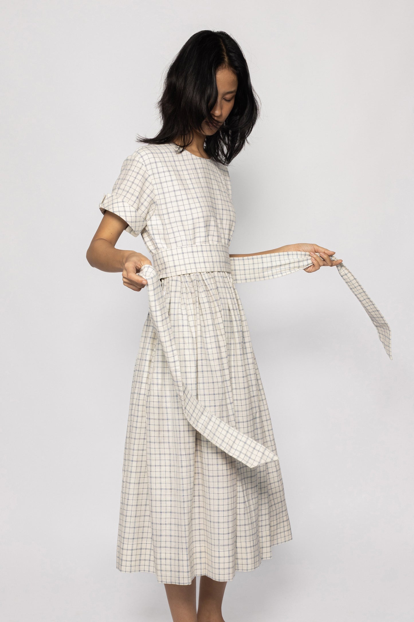 Plains Design Letter Dress - full body of beige checkered dress with short sleeves and a detachable belt