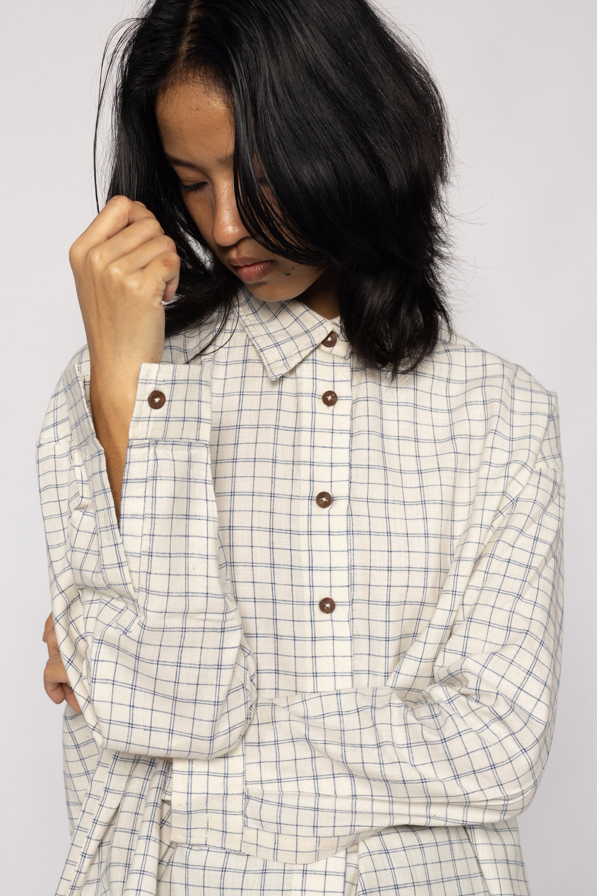 Plains Design Letter Shirt – side view showing dropped shoulder silhouette and relaxed oversized fit, handspun cotton check